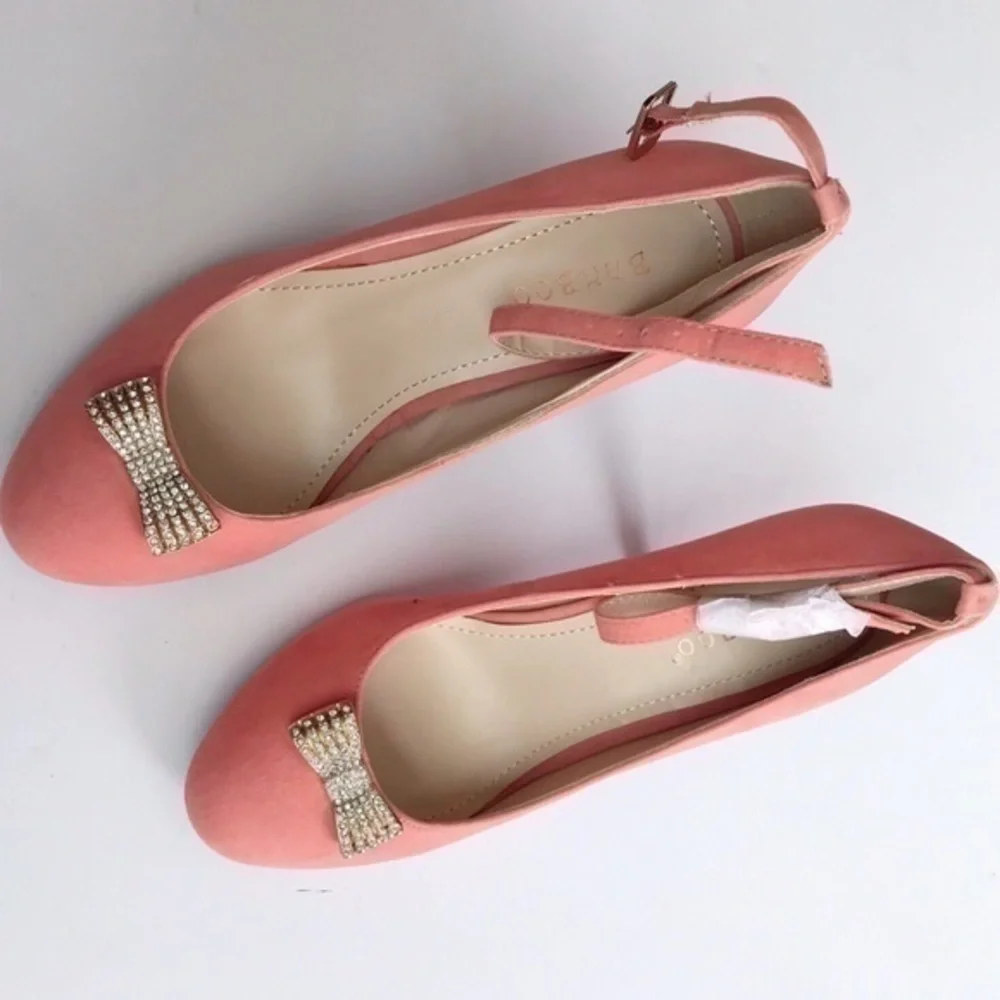 Pink faux suede bamboo heels with bow
